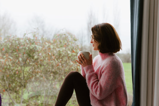 Lady sat in window