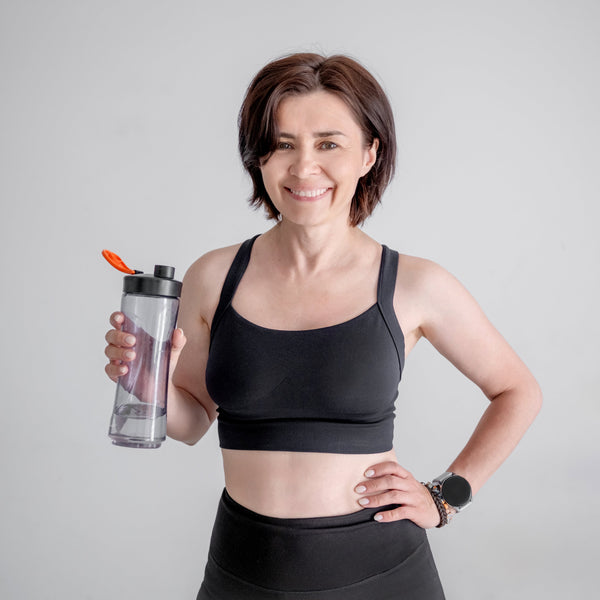 Women aged 40 in gym kit 